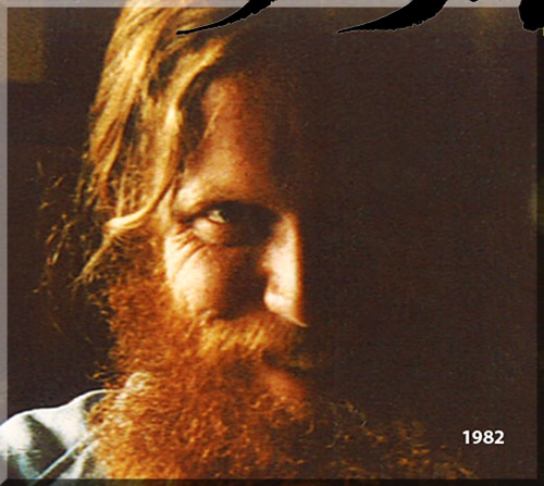 Nineteen eighty-two close up photo of Jerry Michelsen with a long, red beard and mustache.